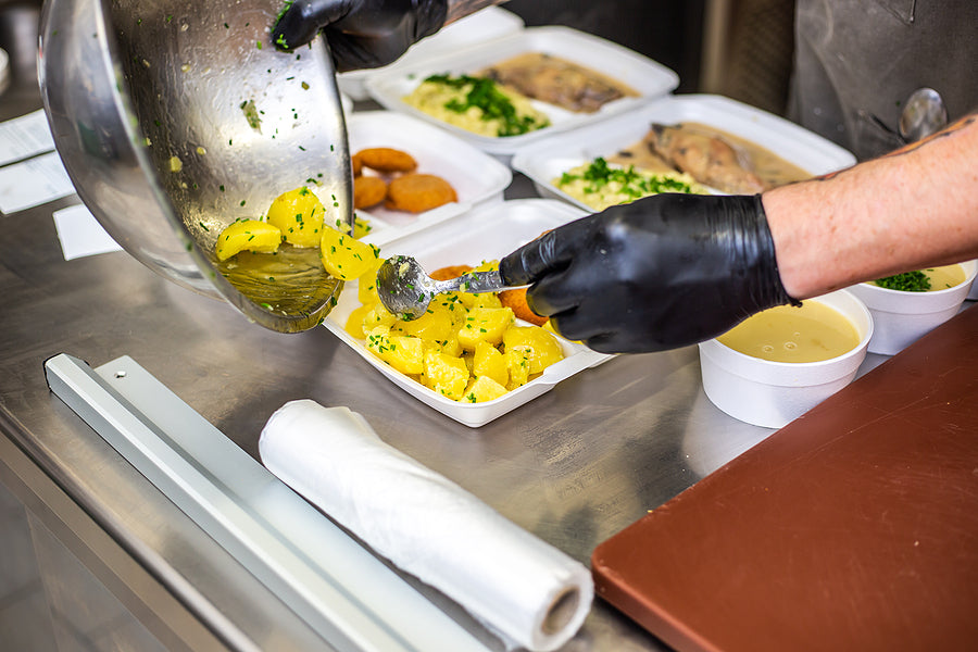 plating-food-in-commercial-kitchen-ghost-kitchen-le-gourmet-factory.jpg